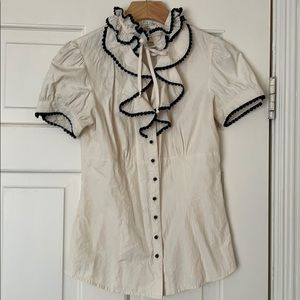 Ruffled blouse with black trim